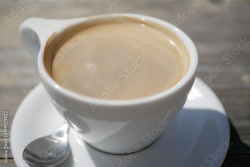 Sunny Delicious Americano on Wooden Table - Narrow DOF