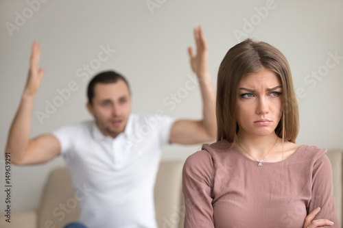 Принти на полотні Family couple arguing, mad husband yelling at upset wife, reducing her to tears,
