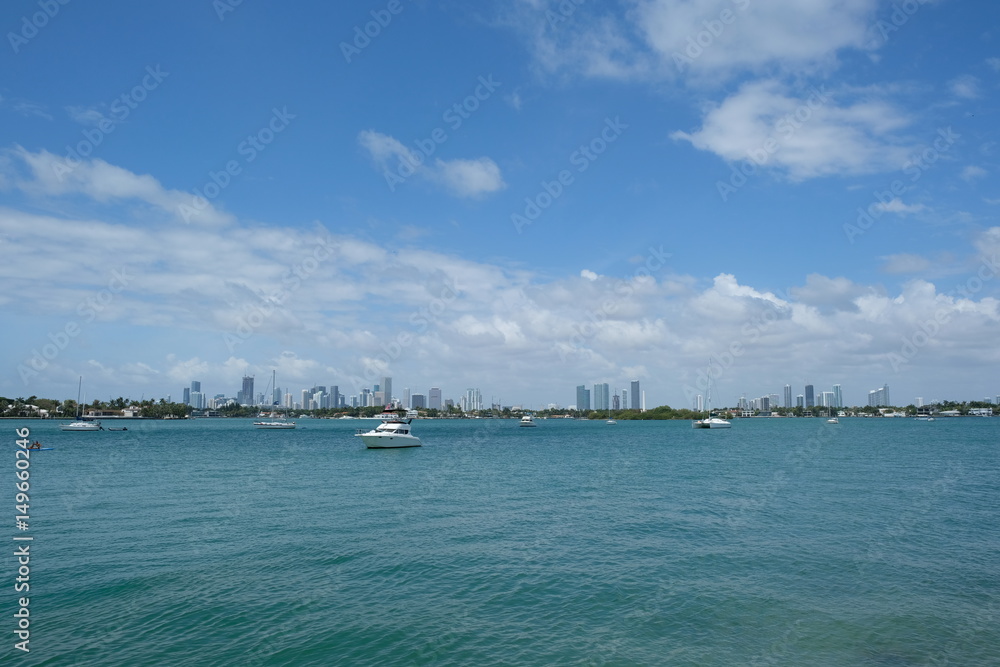 Luxury yachts in front of Miami skyline