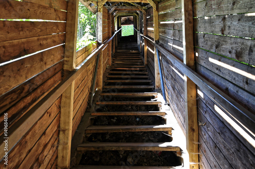 Fototapeta Naklejka Na Ścianę i Meble -  Wooden pathway with gap between the steps