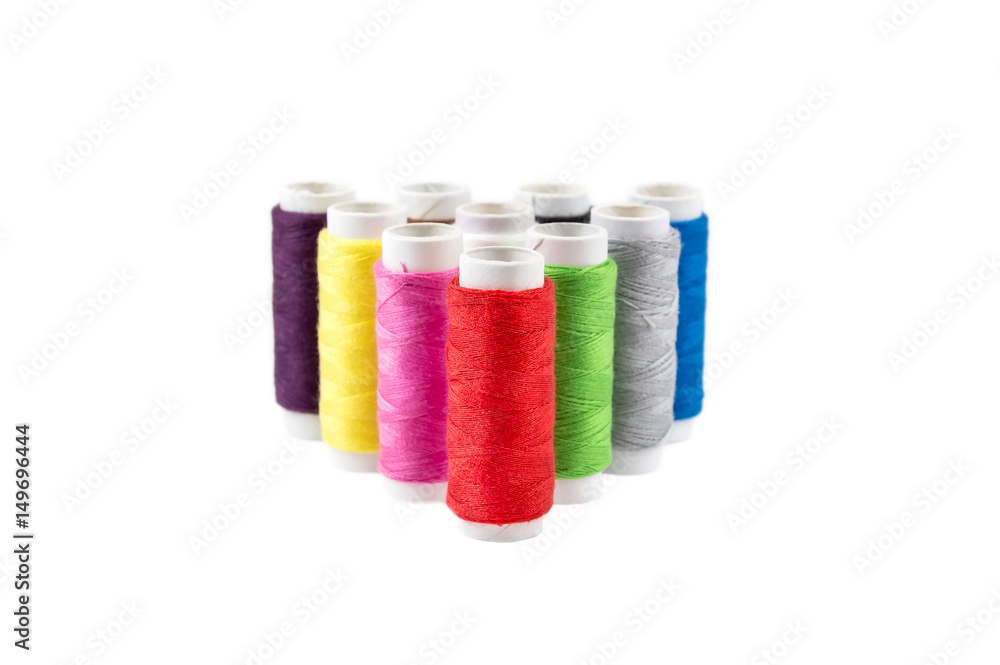 Colorful sewing threads isolated on white background. Colorful sewing threads isolated on white background.