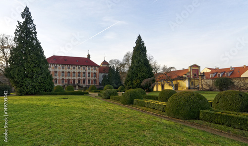 Old unused building with lawn infront of it