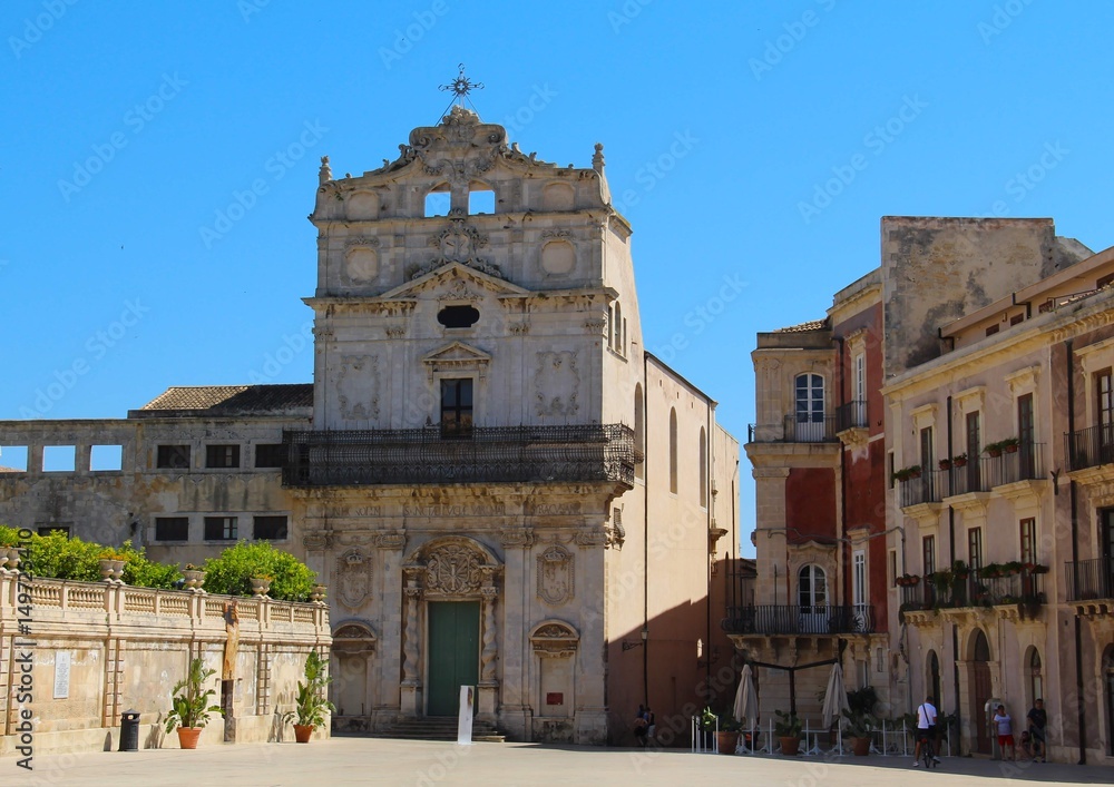 Fototapeta premium The old church of Santa Lucia-Al-Sepolcro was built in the 12th century, Syracuse. The temple is built in 2 styles: the lower part of the church is Baroque, the upper one is built in the Rococo style.