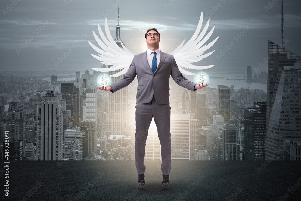 Angel investor concept with businessman with wings Angel investor concept with businessman with wings