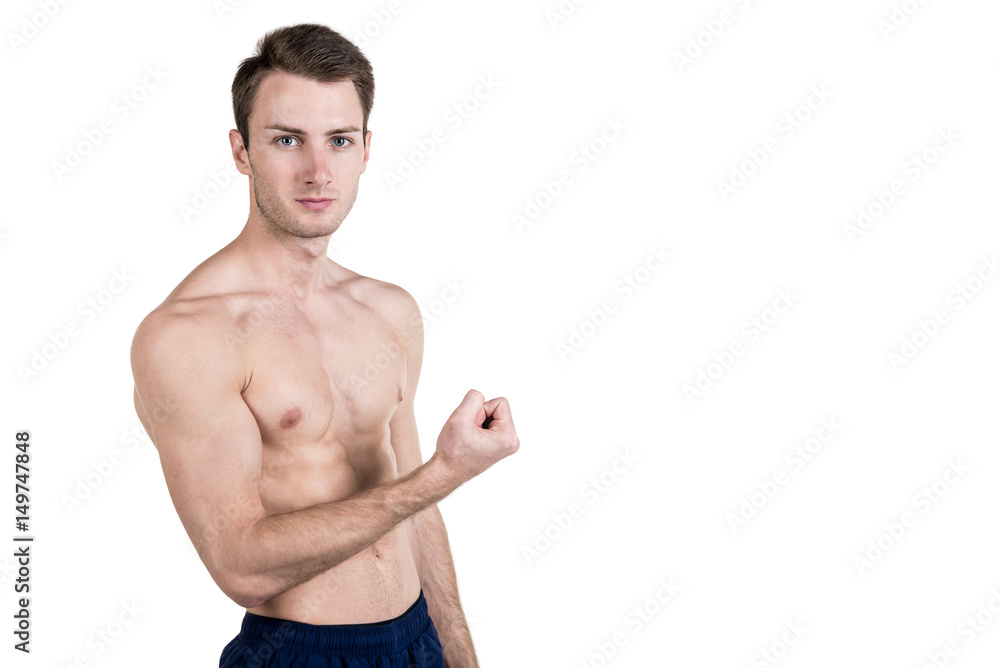 Healthy lifestyle and fitness. Handsome guy sports a physique, with a naked body, demonstrates a muscle, isolated on a white background. Horizontal frame Healthy lifestyle and fitness. Handsome guy sports a physique, with a naked body, demonstrates a muscle, isolated on a white background. Horizontal frame