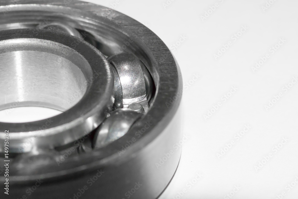 Chrome plated bearing on a white background Chrome plated bearing on a white background