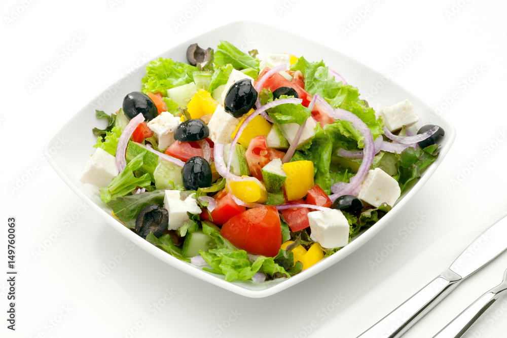 close up view of nice yummy salad on white back