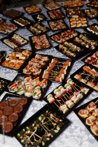 Buffet table with assorted canapes