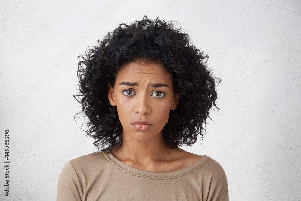 © wayhome.studio - Headshot of regretful young mixed race woman feeling sorry for doing something wrong, looking at camera with brows frowned, doing her best to get forgiveness from her boyfriend during quarrel © wayhome.studio - Headshot of regretful young mixed race woman feeling sorry for doing something wrong, looking at camera with brows frowned, doing her best to get forgiveness from her boyfriend during quarrel