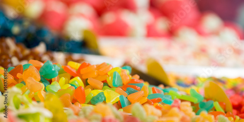 Vibrant and multi colored mixed sweets in a street market