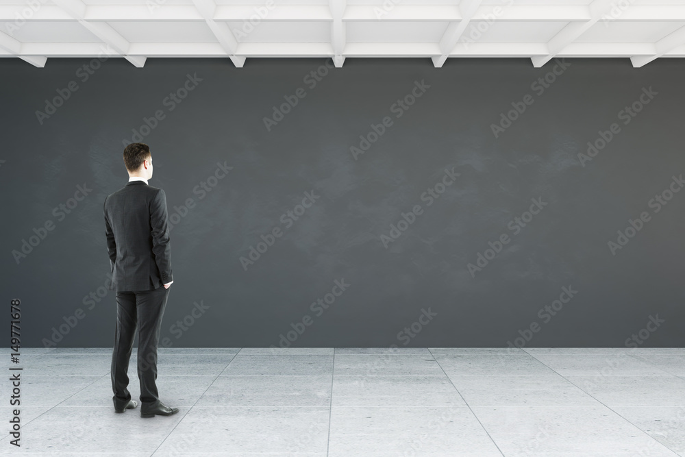Man looking at empty wall Man looking at empty wall