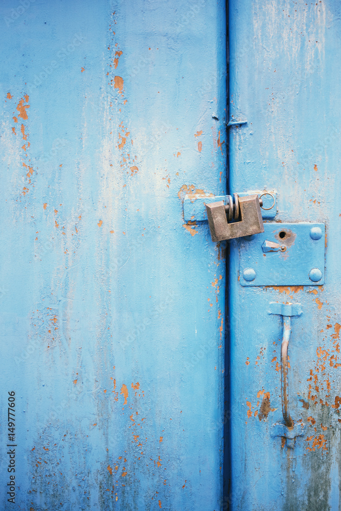 The old door locked with a padlock hanging brackets. Set of backgrounds The old door locked with a padlock hanging brackets. Set of backgrounds