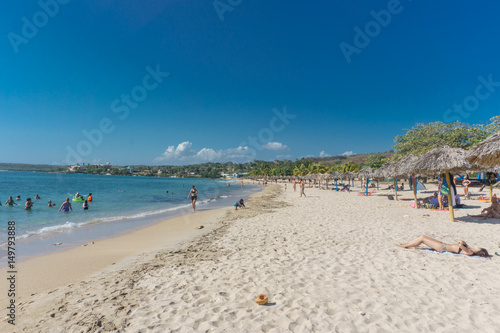 Cienfuegos, Cuba – January 1, 2017: Caribbean beach Playa Rancho Luna in Cienfuegos. Sandy coast © carles