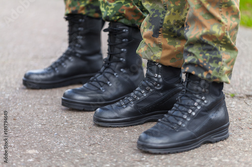 german army shoes in a line