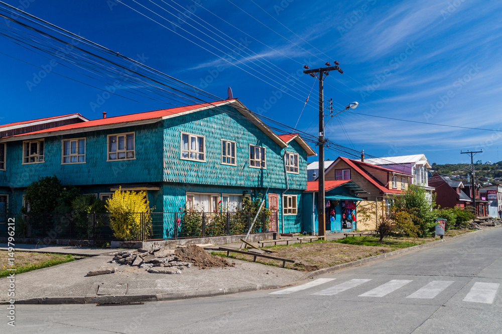 ACHAO, CHILE - MARCH 21, 2015: View of houses lining streets of Achao village, Quinchao island, Chile
