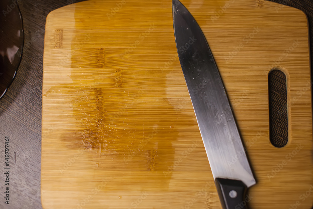 kitchen knife on a cutting board