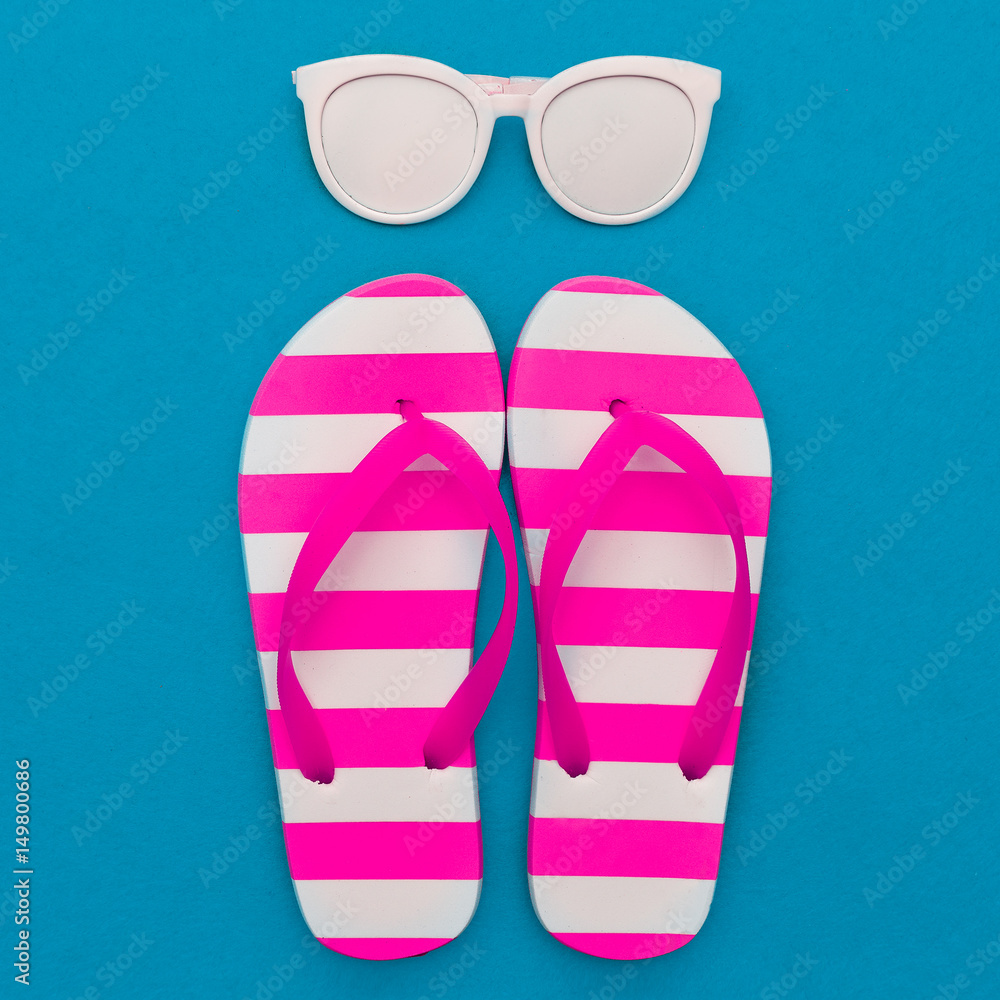Beach season is open. Marine style. Flip-flops, stripes, sunglasses. Minimal art