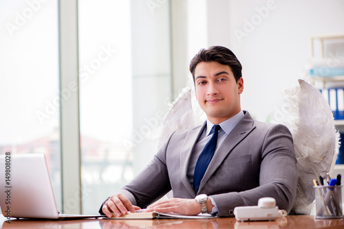 Angel investor concept with businessman and wings