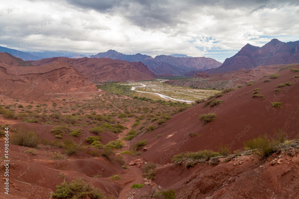 Colorful layered rock formations in Quebrada de Cafayate valley, Argentina. National park Quebrada de las Conchas.