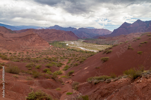Colorful layered rock formations in Quebrada de Cafayate valley, Argentina. National park Quebrada de las Conchas.