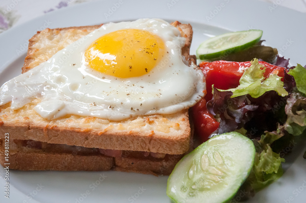 Fototapeta premium Sandwiches with white bread bacon and egg .