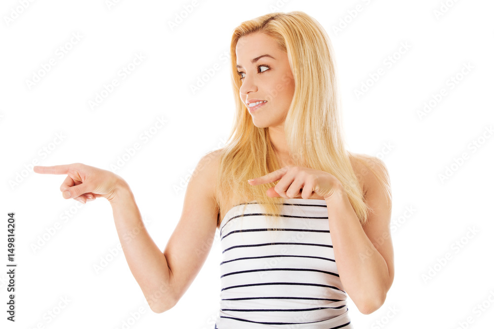 Picture of attractive student pointing her finger. Picture of attractive student pointing her finger.