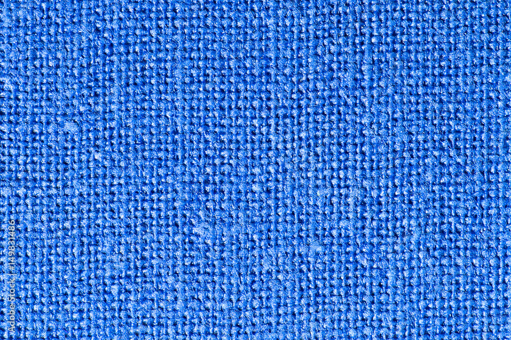 Blue fiber fabric closeup macro pattern. Blue fiber fabric closeup macro pattern.