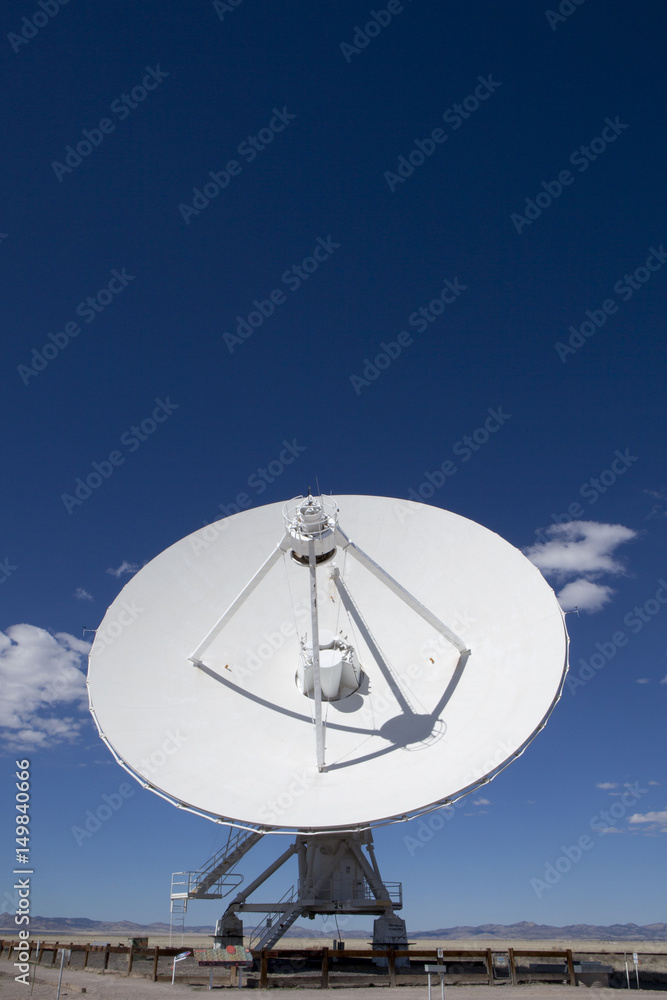 Radio telescope dish pointed up at the sky