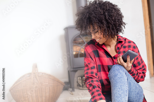 Young african american girl with mobile phone.