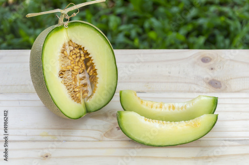 Wallpaper Mural Ripe sweet melon on table in garden Torontodigital.ca