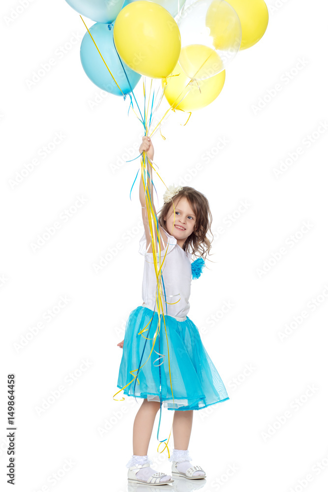 Little girl with multicolored balloons. Little girl with multicolored balloons.