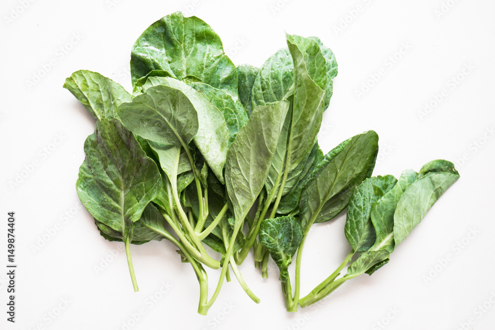 Fresh chinese kale on white background ready to cooking,organic vegetable Fresh chinese kale on white background ready to cooking,organic vegetable