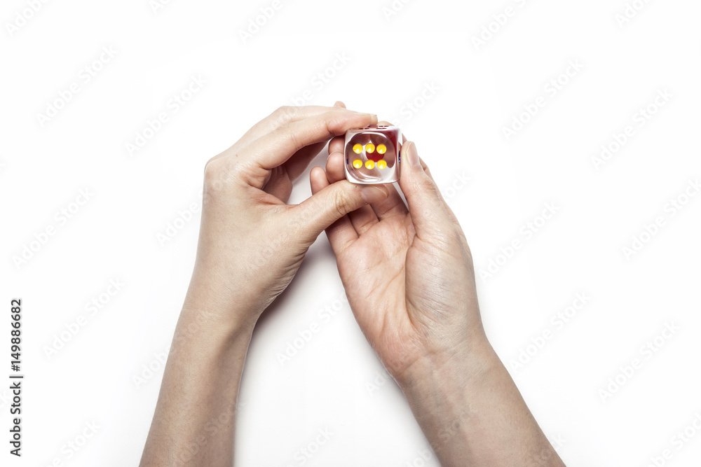 woman hand hold a dice isolated white. woman hand hold a dice isolated white.
