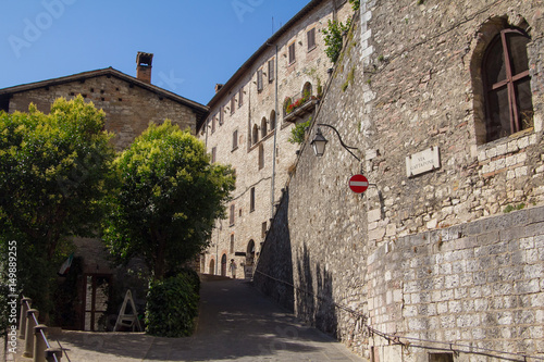 Fototapeta Naklejka Na Ścianę i Meble -  Street of Gubbio with medieval buildings, Italy