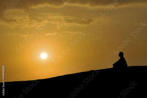 meditation under sunset © TPG