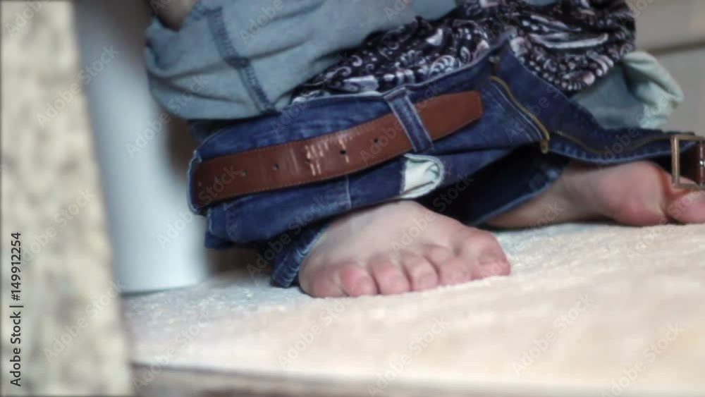 Man with upset stomach and Diarrhea sitting on toilet taking a poop Stock ビデオ | Adobe Stock