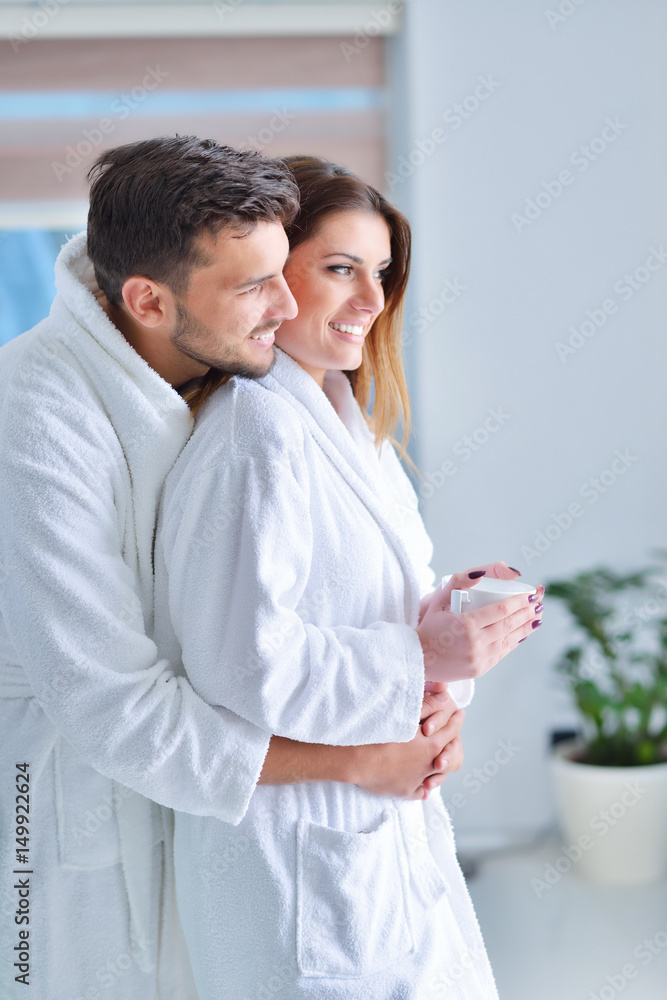 Young couple posing in their kitchen
