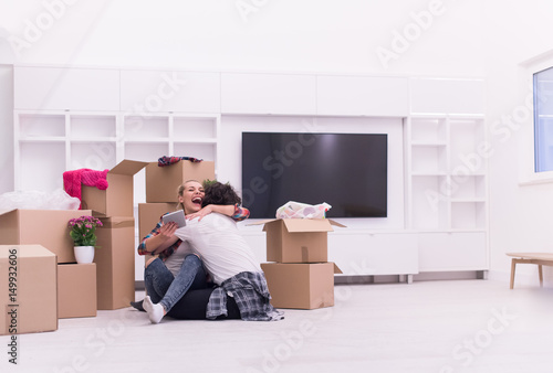 young couple moving  in new house