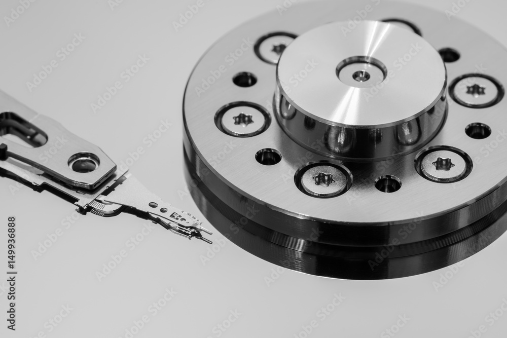 Closeup macro of the tiny parts on a hard disk drive read-write head Closeup macro of the tiny parts on a hard disk drive read-write head