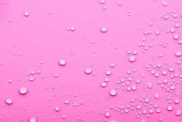 water drops on a pink background