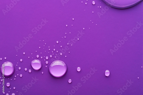 Water drops on a purple background
