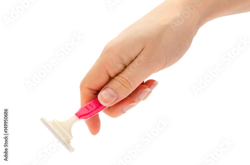 woman hand holding razor blades