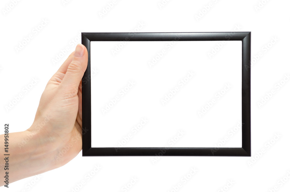 woman hand holding dark wood photo frame. woman hand holding dark wood photo frame.