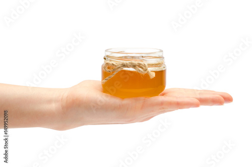 woman hand holding honey.