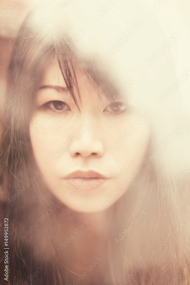 Sensual japanese girl behind glass Sensual japanese girl behind glass