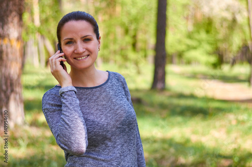 beautiful young girl nature talking on the phone © Sviatoslav Kovtun