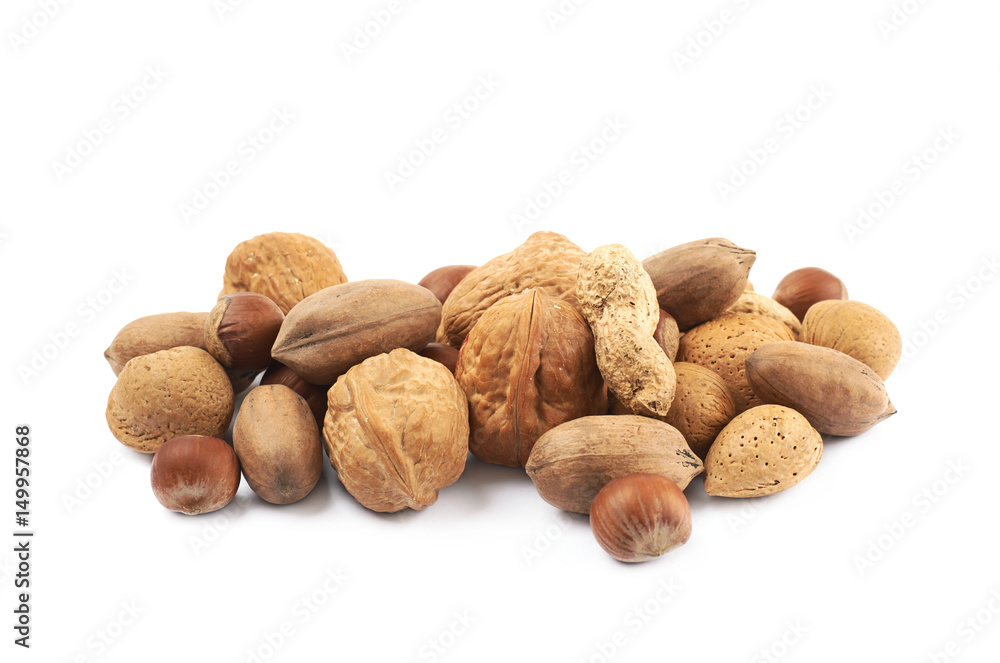 Pile of multiple kind of nuts isolated Pile of multiple kind of nuts isolated