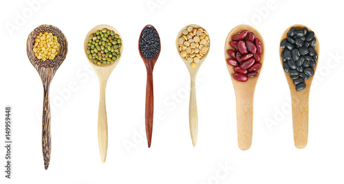 Variety of Whole grain beans in wood spoon isolated on white background.