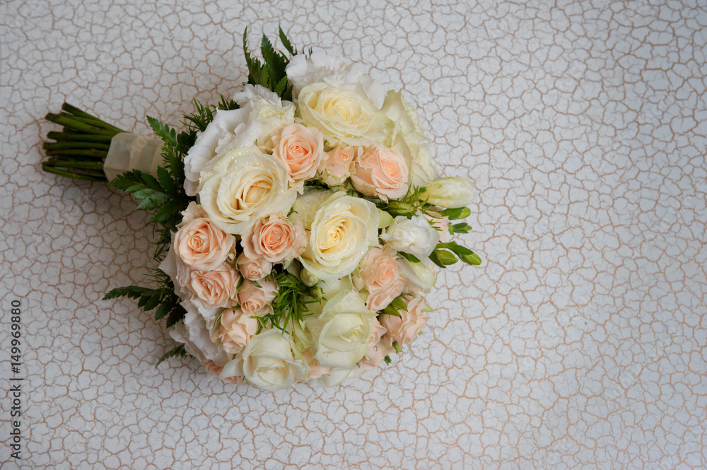 Closeup Wedding bouquet with white and pink roses, top view Closeup Wedding bouquet with white and pink roses, top view