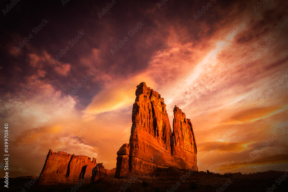 Arches National Parks The Organ lit by a fiery sunrise